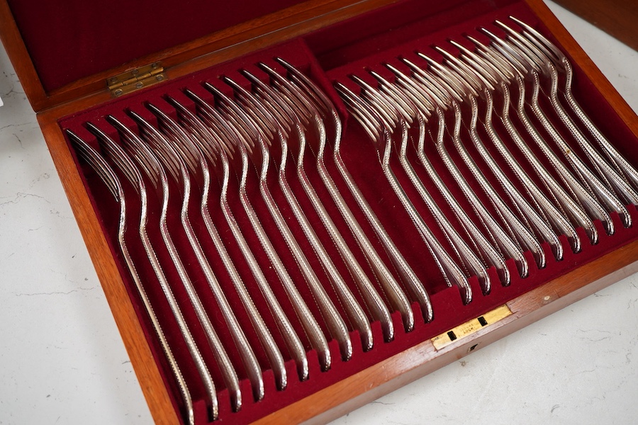 A plated bead edged part canteen of cutlery housed in two cases